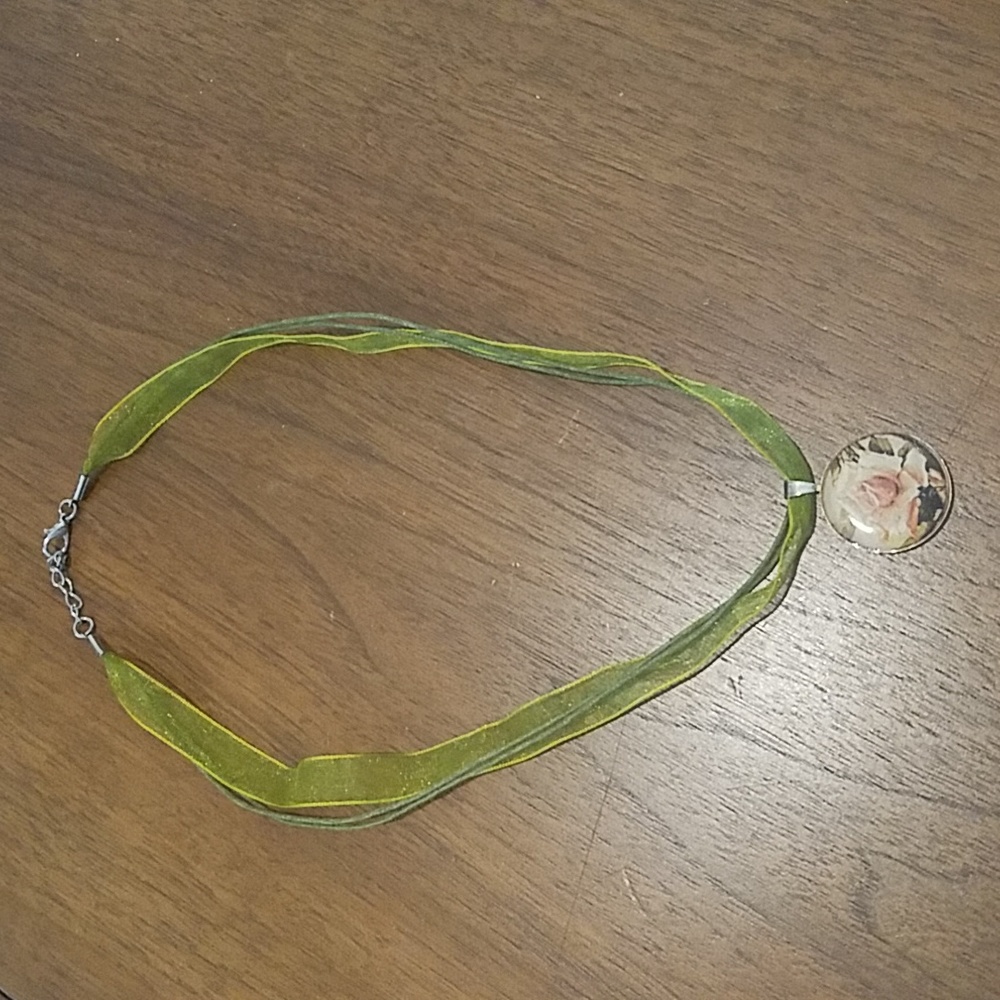 Green ribbon necklace rose pendant